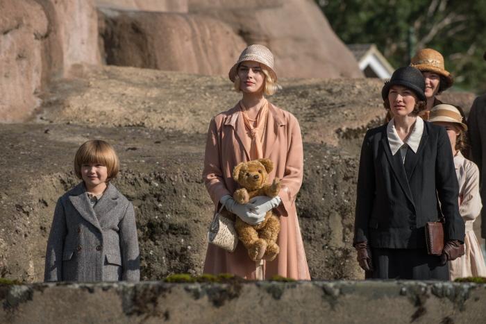 Will Tilston, Margot Robbie and Kelly Macdonald in the film GOODBYE CHRISTOPHER ROBIN.